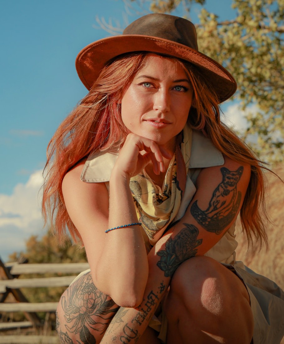 Kenna, founder of Postdusk Socials